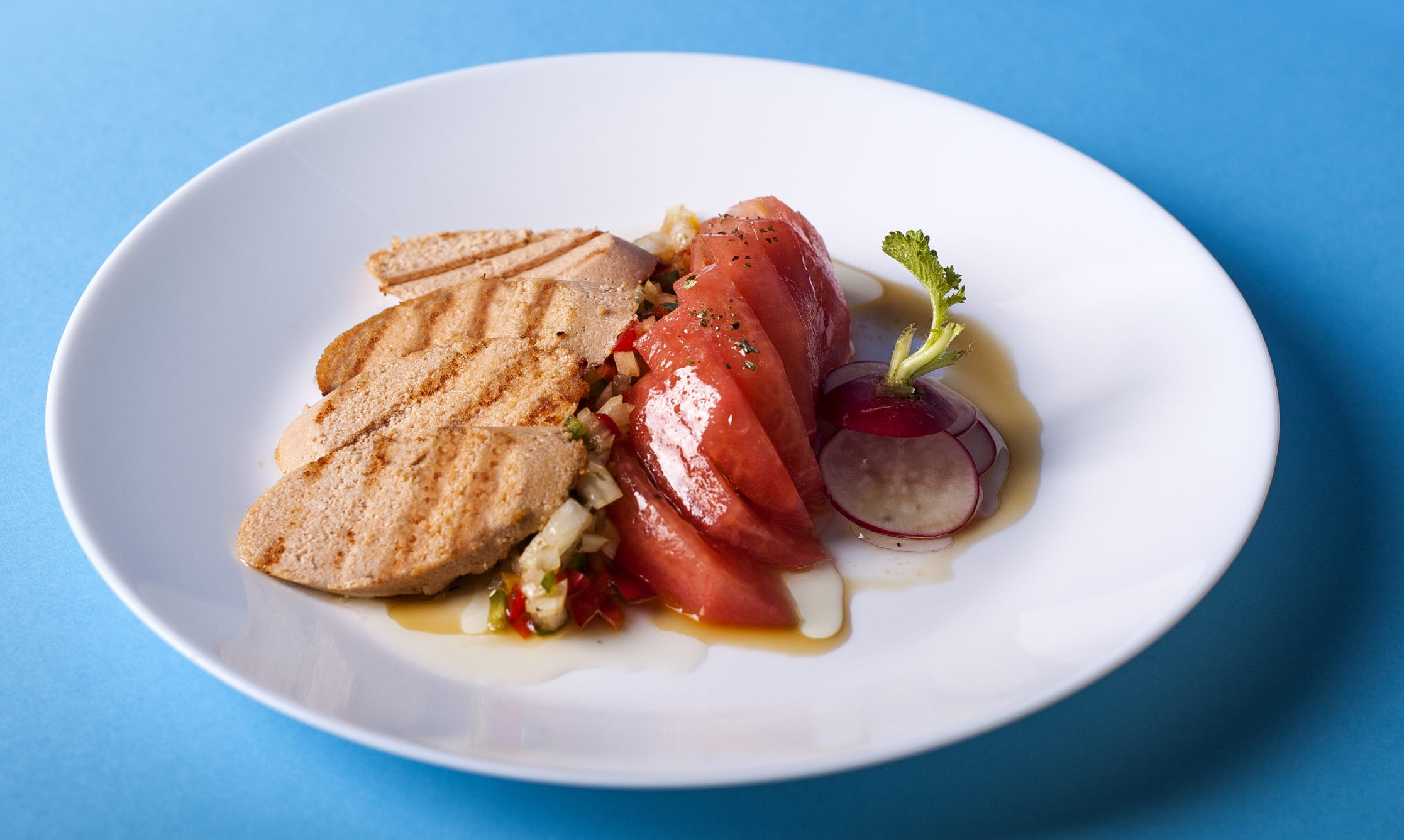 Embumar de Huevas de Bacalao con Tomate aliñado.